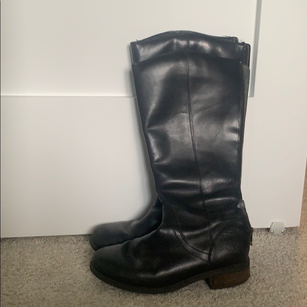Black leather UGG rubber sole boots